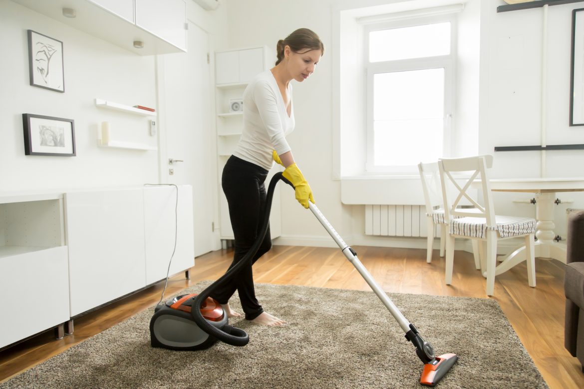 homeowner vacuuming